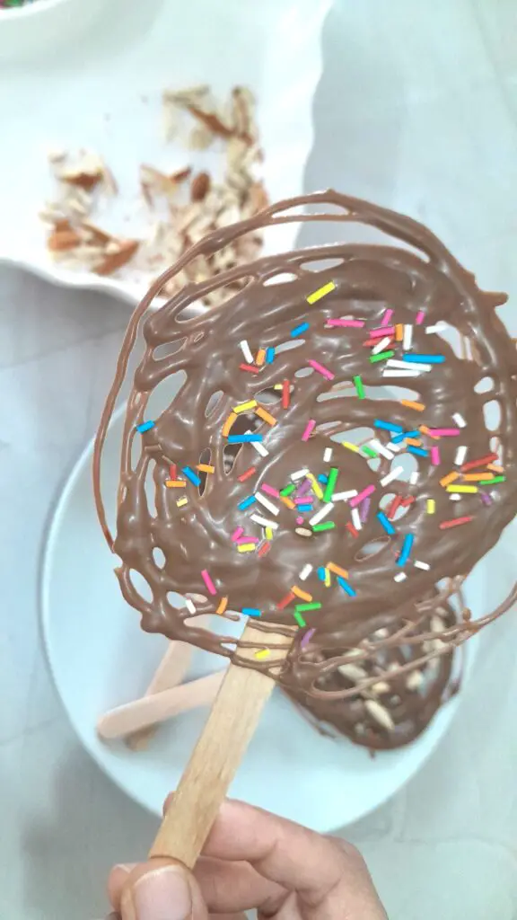 Chocolate Lollipops with sprinklers